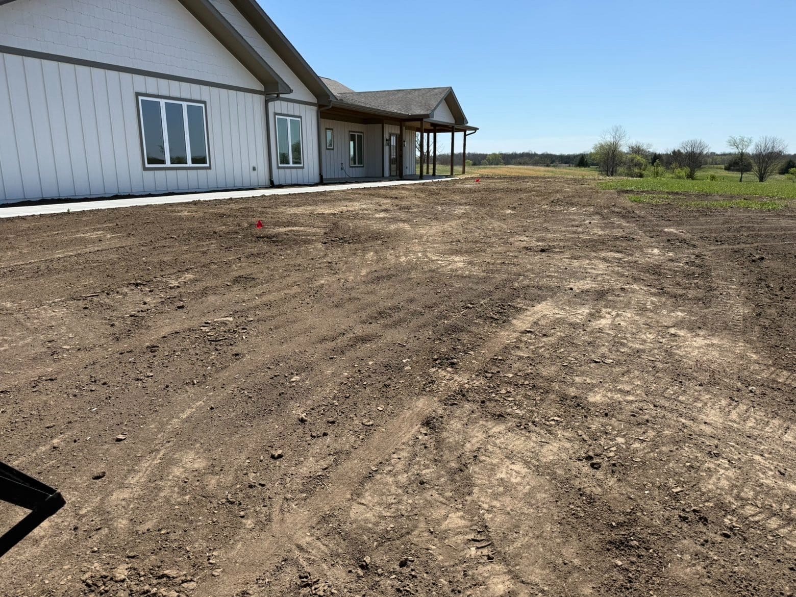 Freshly graded yard around a new build in the Kansas City area